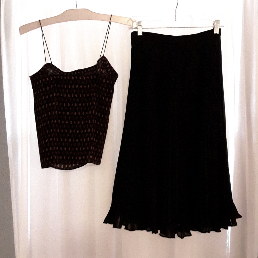 Manning Silver, size 8 black, gold and burgundy outfit.